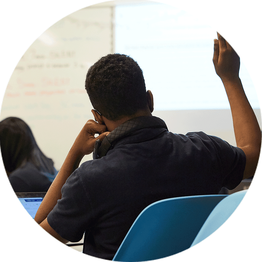 student raising their hand