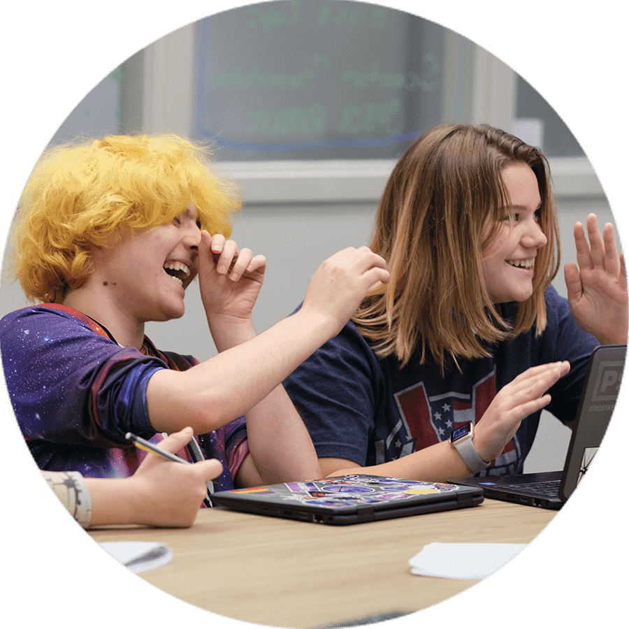 two students laughing