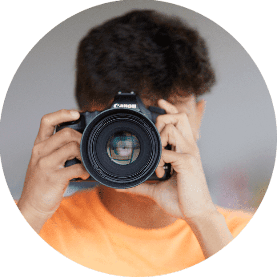 a student holding a camera