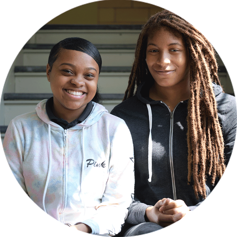 two students smiling